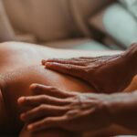 A soothing back massage session in a spa setting, focusing on wellness and relaxation.