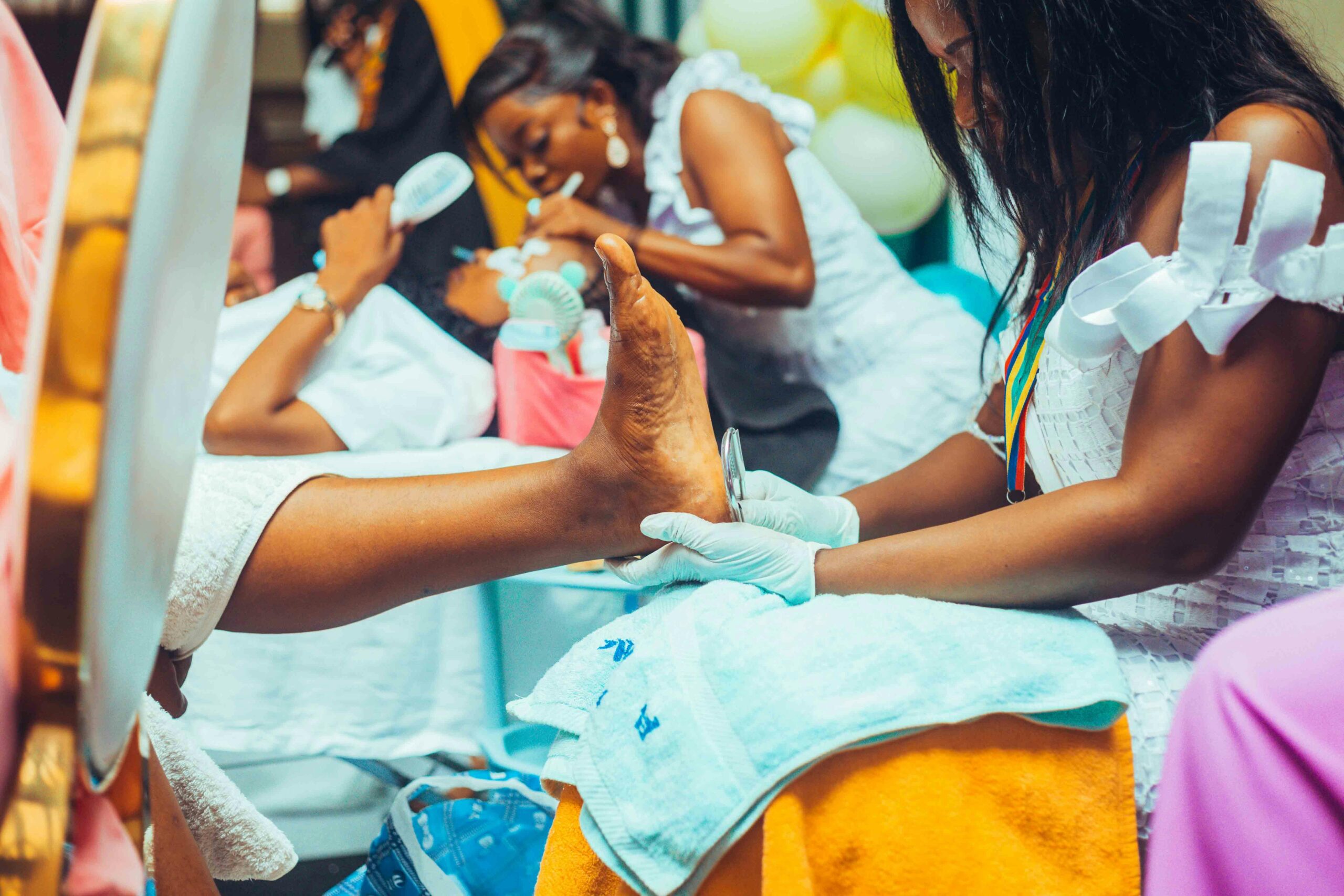 Women receiving a pedicure treatment in a spa, showcasing relaxation and self-care.